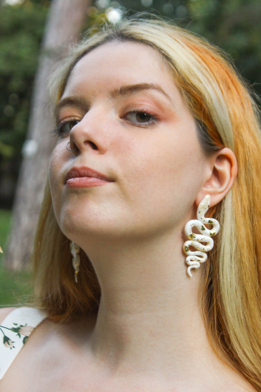 White Snakes with Gold Earrings