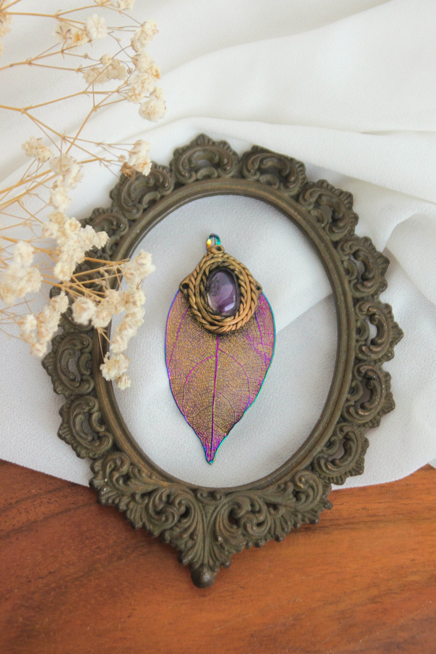 Titanium-coated leaf Pendant with Amethyst