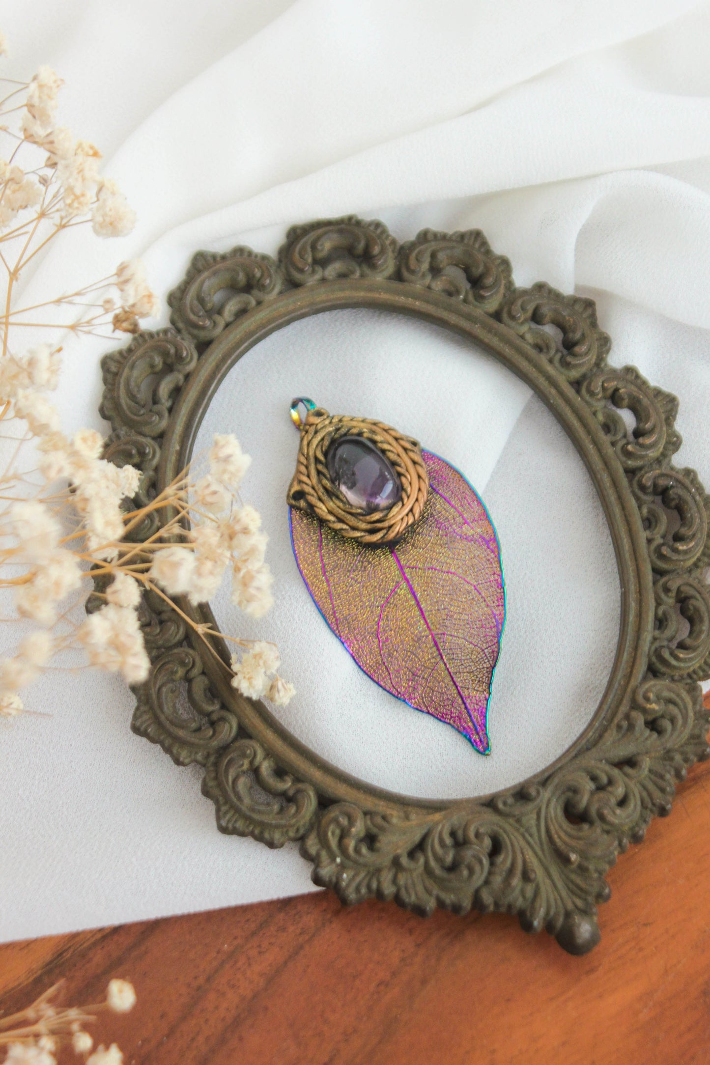 Titanium-coated leaf Pendant with Amethyst