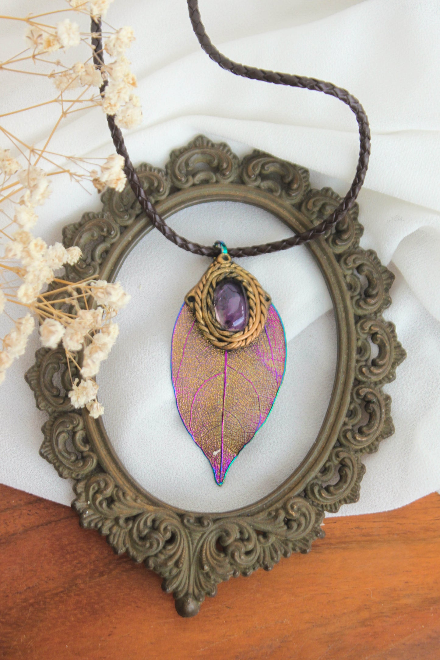 Titanium-coated leaf Pendant with Amethyst