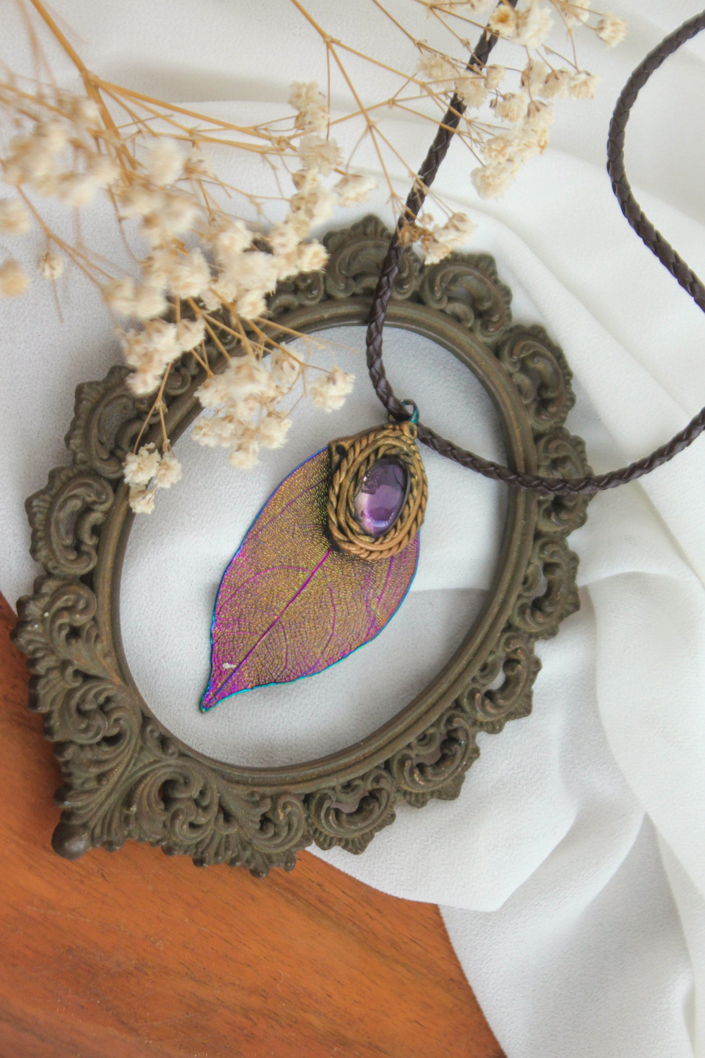 Titanium-coated leaf Pendant with Amethyst