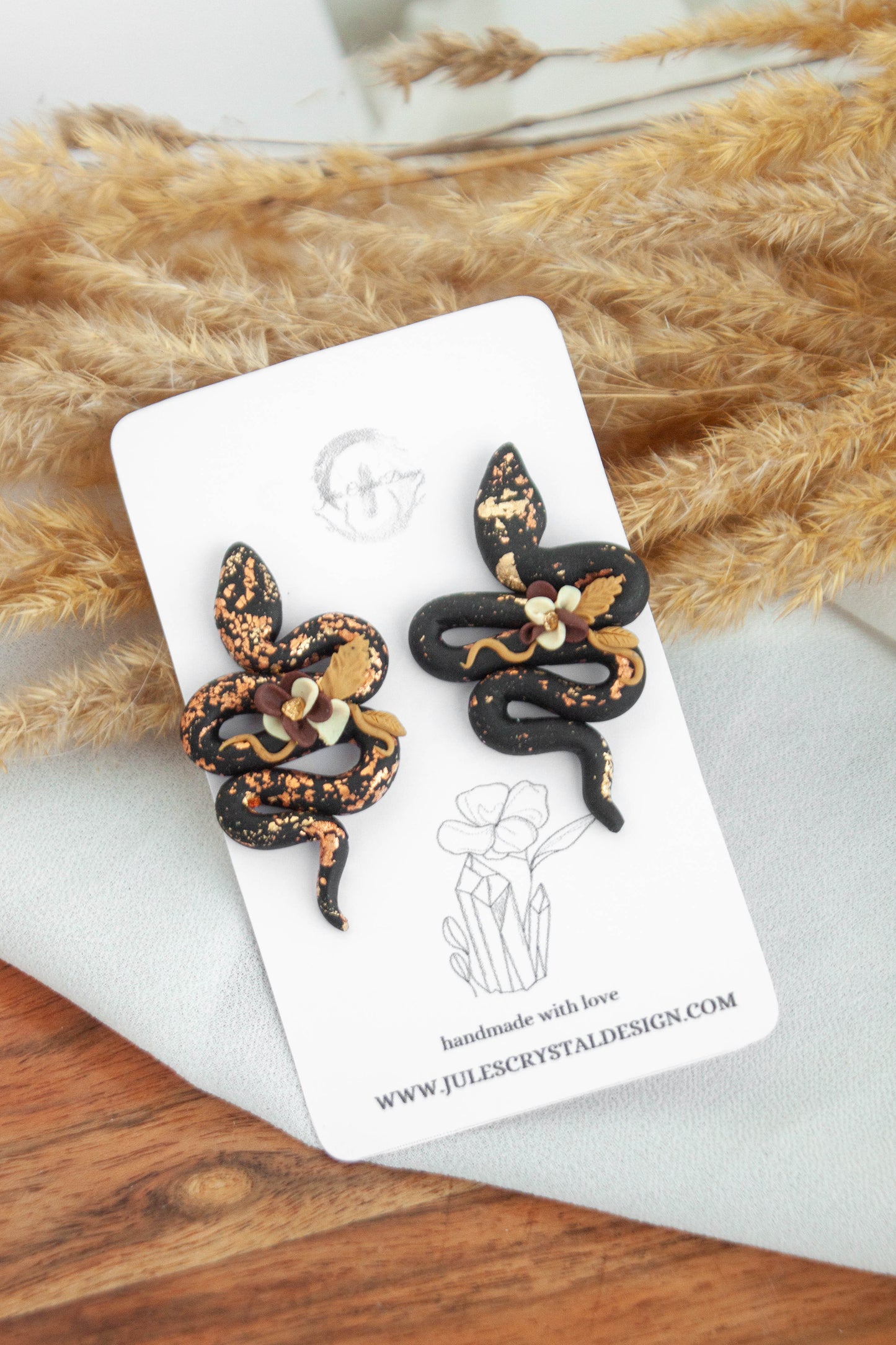 Black Snake Earrings with flower