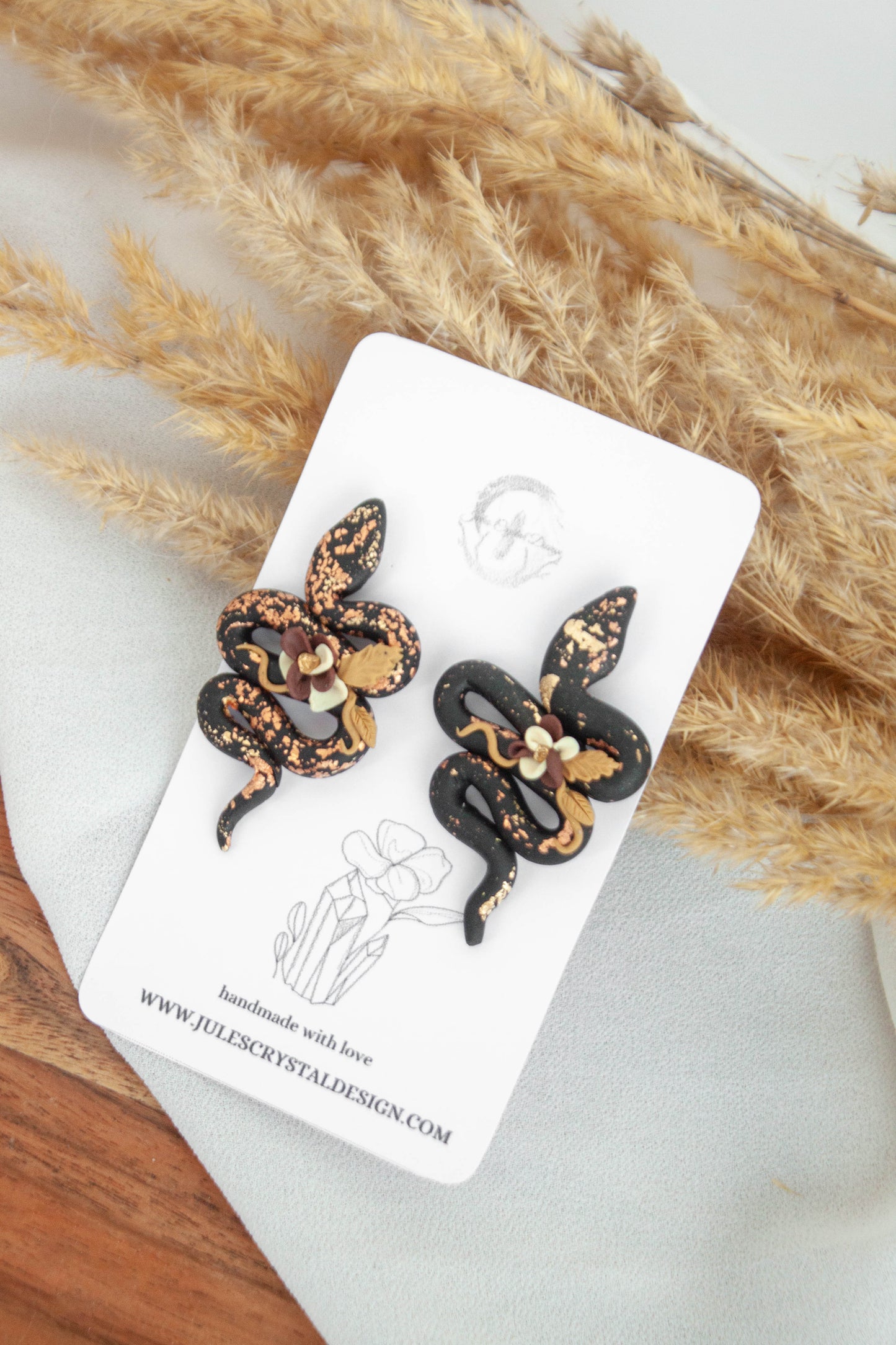 Black Snake Earrings with flower