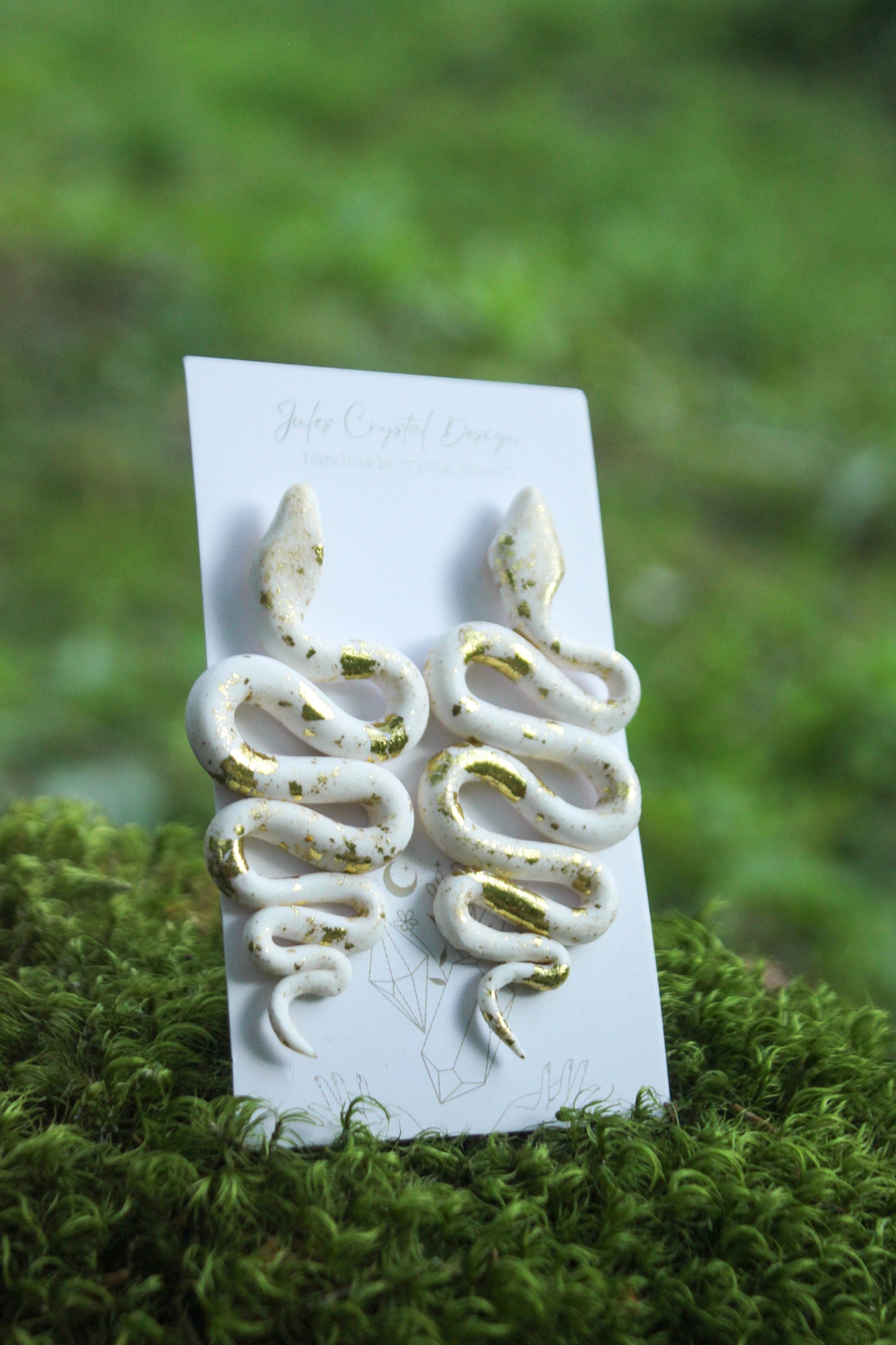 White Snakes with Gold Earrings