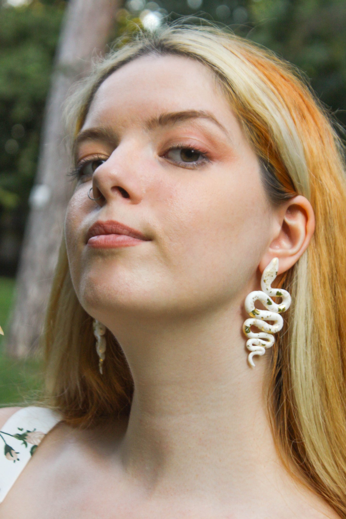 White Snakes with Gold Earrings