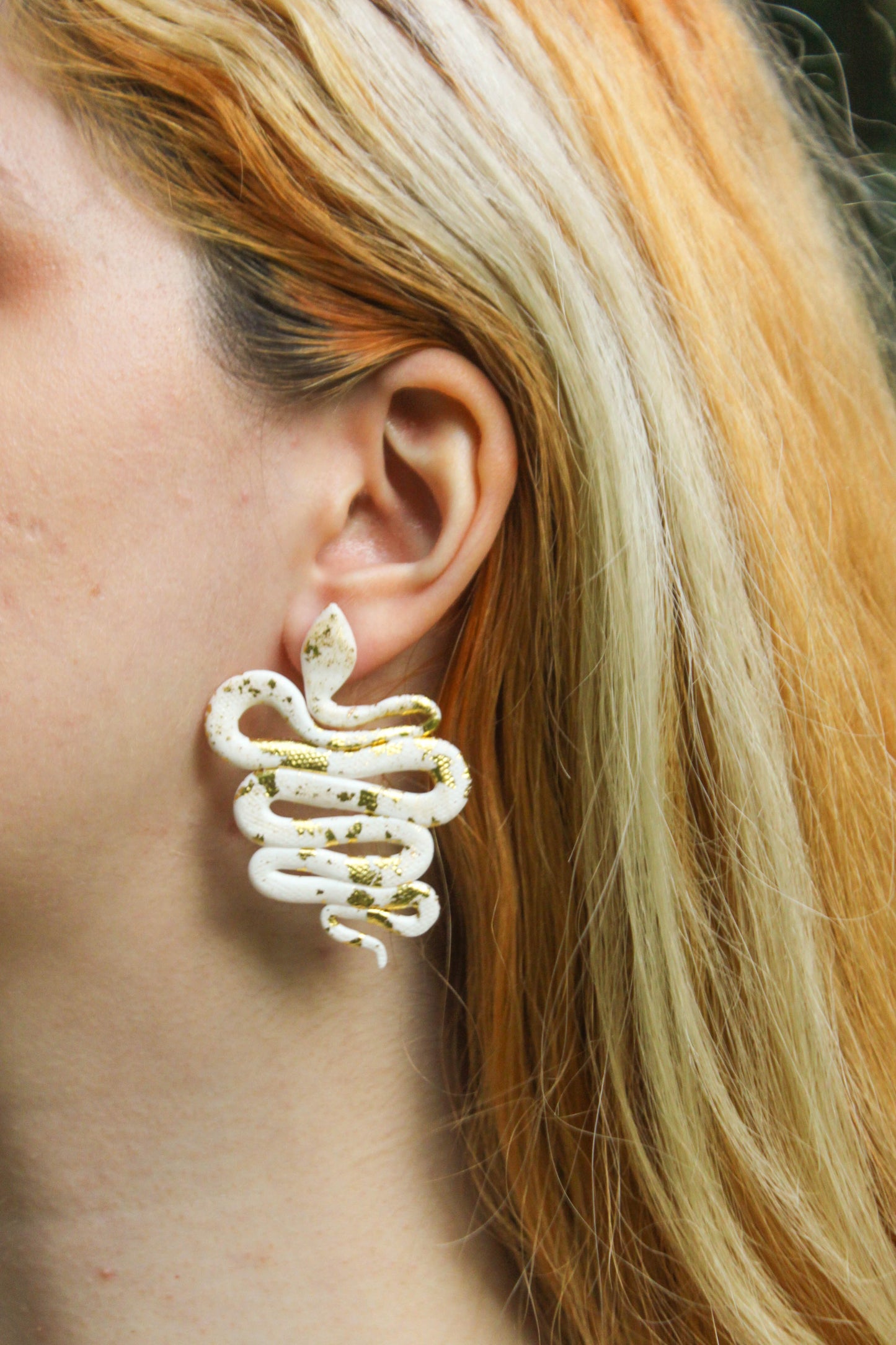 White Snakes with Gold Earrings