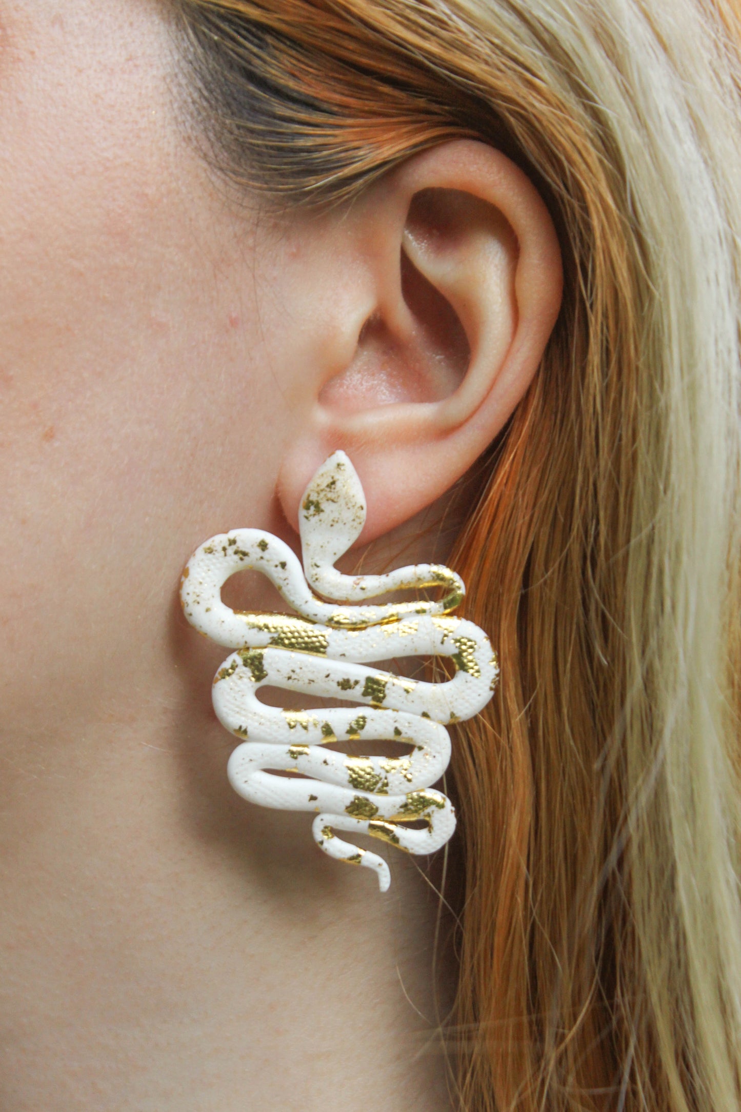 White Snakes with Gold Earrings